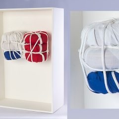 Packaged 3 of n : (17.5"x12"x5.5"  wood, rope, and cloth wrapped object mounted on wood panel)