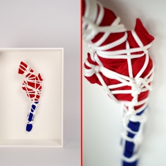 Packaged 7 of n : (17.5"x12"x5.5" wood, rope, and cloth wrapped M1873 Cavalry Single Action Revolver mounted on wood panel)